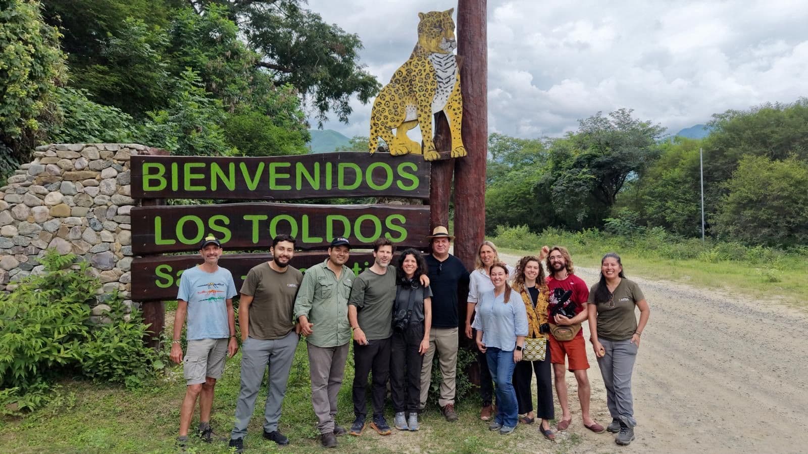 Team members of JRI, RA, Nativa and producers of Into the Rewild gathering at the front of the entrance of Los Toldos in the Alto Pantanal Ark